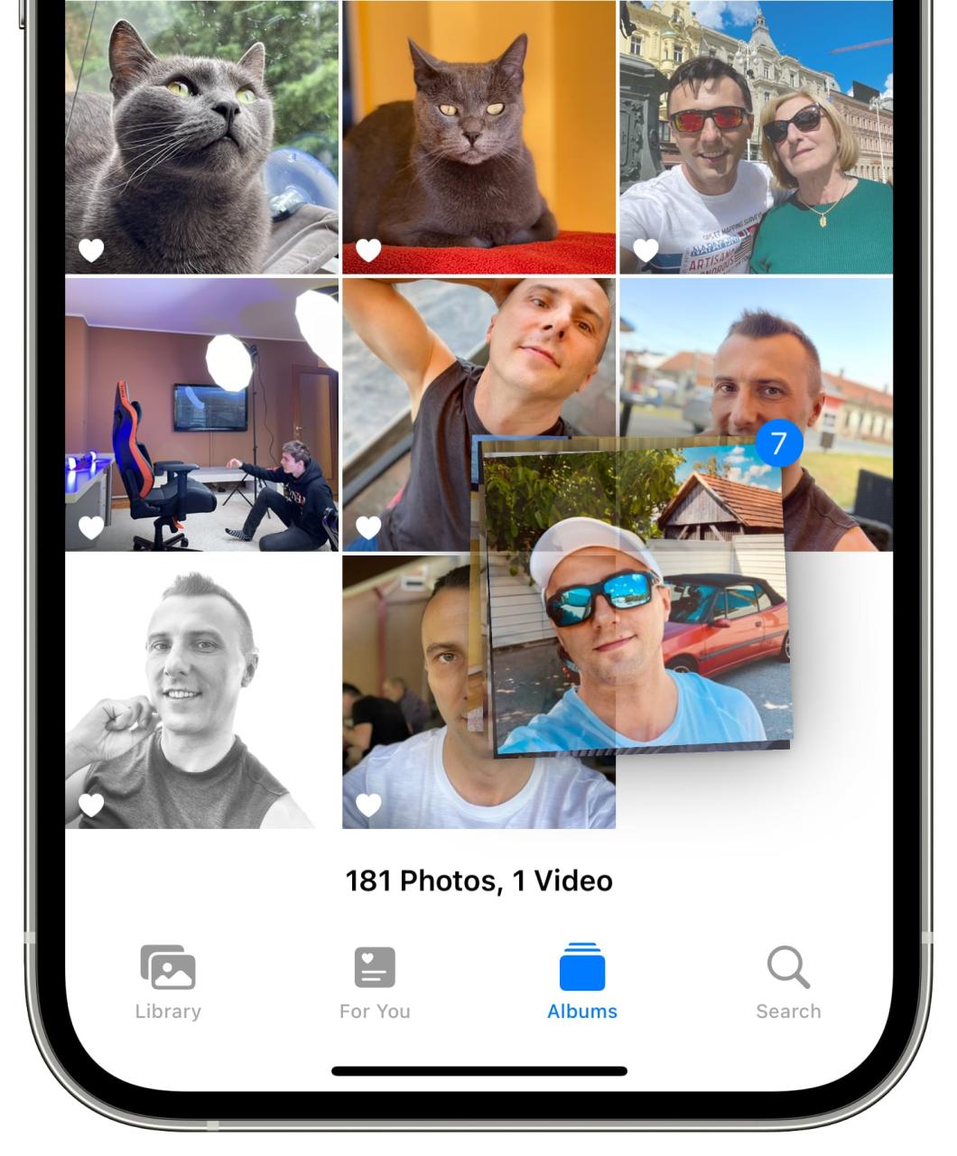 Captura de pantalla de un iPhone que muestra la creación de un paquete de imágenes para arrastrar y soltar en la aplicación Fotos en iOS 17