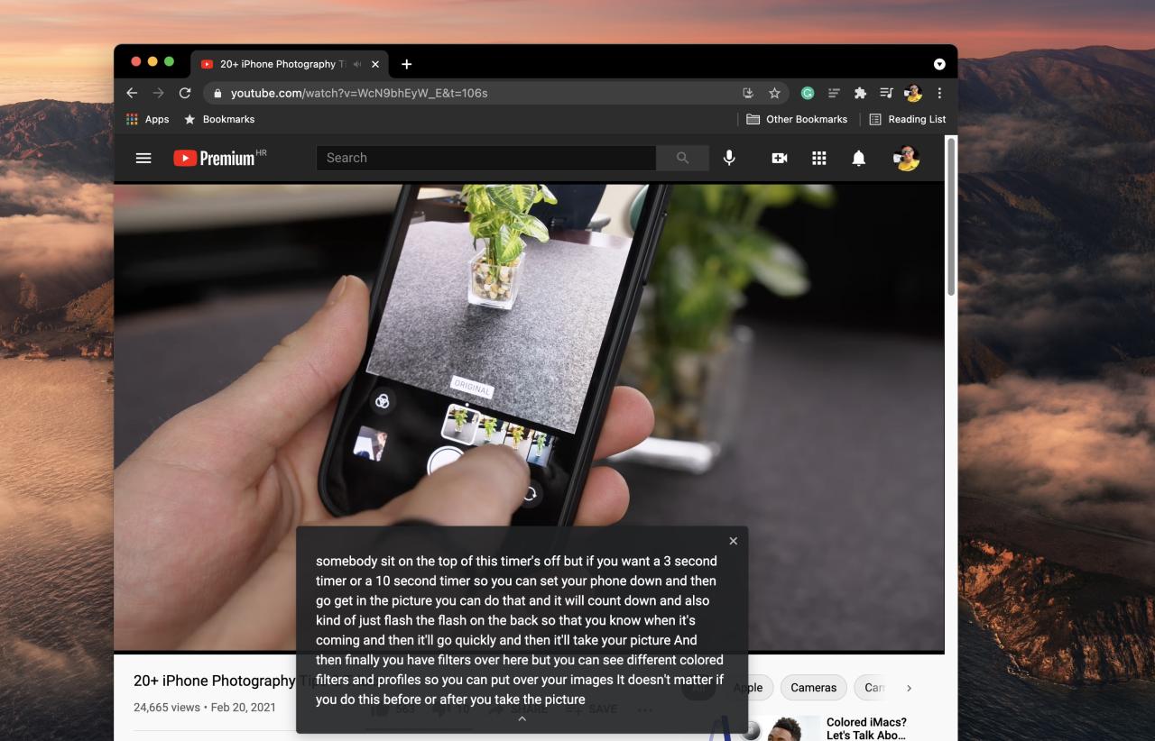 Una captura de pantalla de macOS que muestra Google Chrome para Mac con el cuadro Live Caption ampliado para un video de YouTube