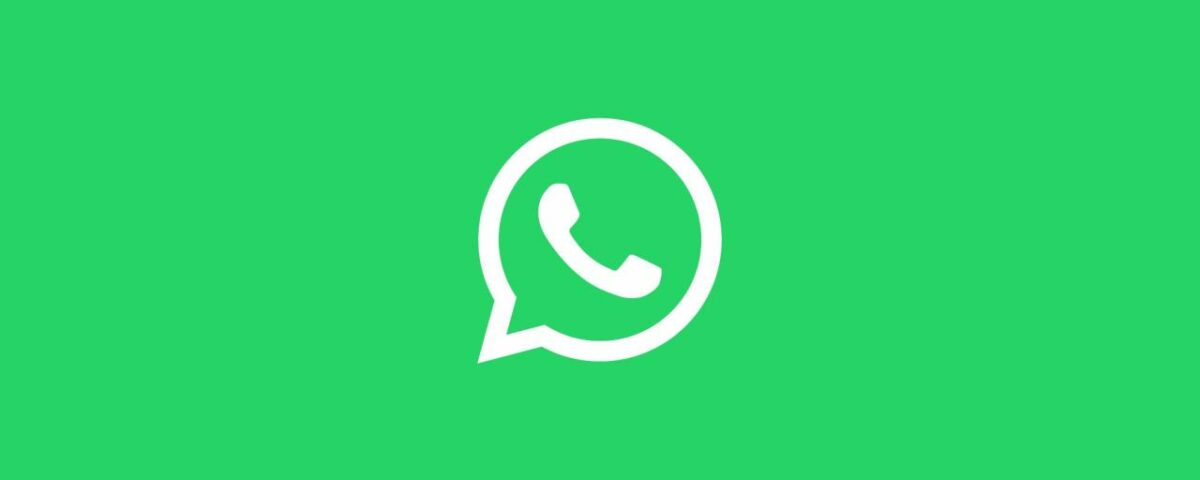 Una ilustración con un logotipo de WhatsApp en blanco sobre un fondo verde