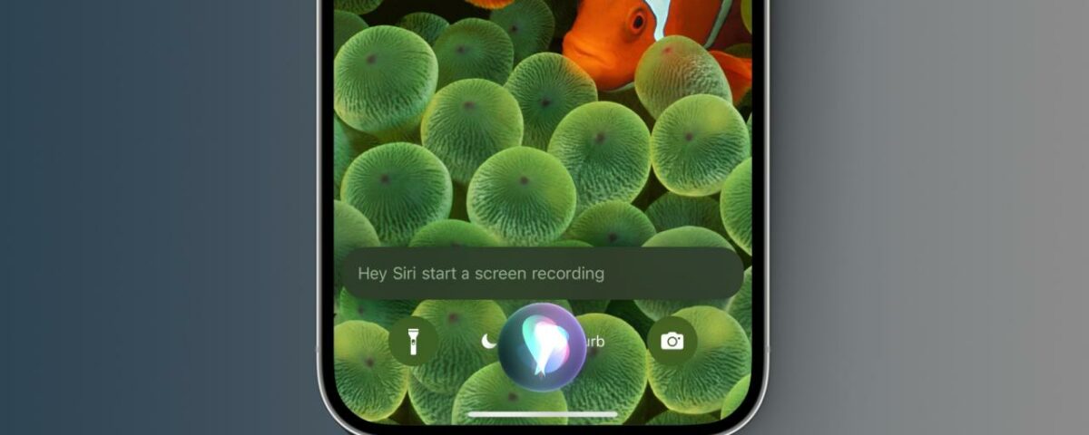Captura de pantalla de iPhone que muestra la pantalla de bloqueo con el comando Siri en la parte inferior para iniciar una grabación de pantalla
