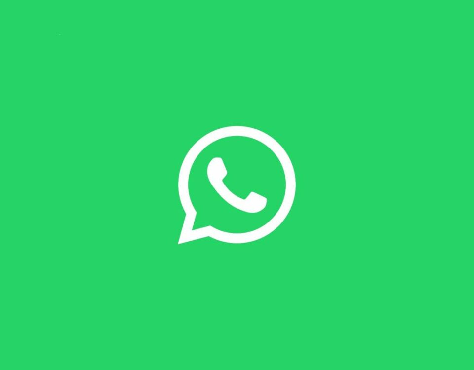 Una ilustración con un logotipo de WhatsApp en blanco sobre un fondo verde